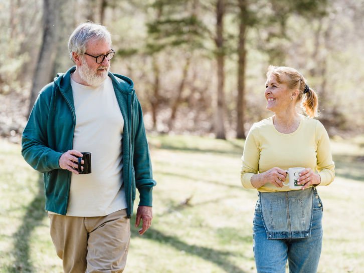 Couple walking by forest